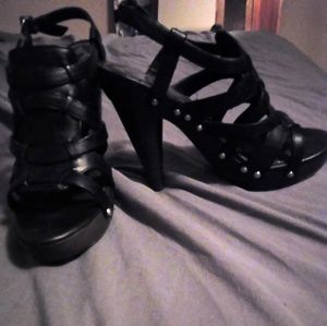 Studded black leather heels.
